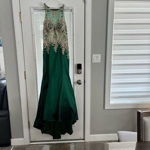 Beautiful emerald green and gold sequenced formal gown! Only worn one time.